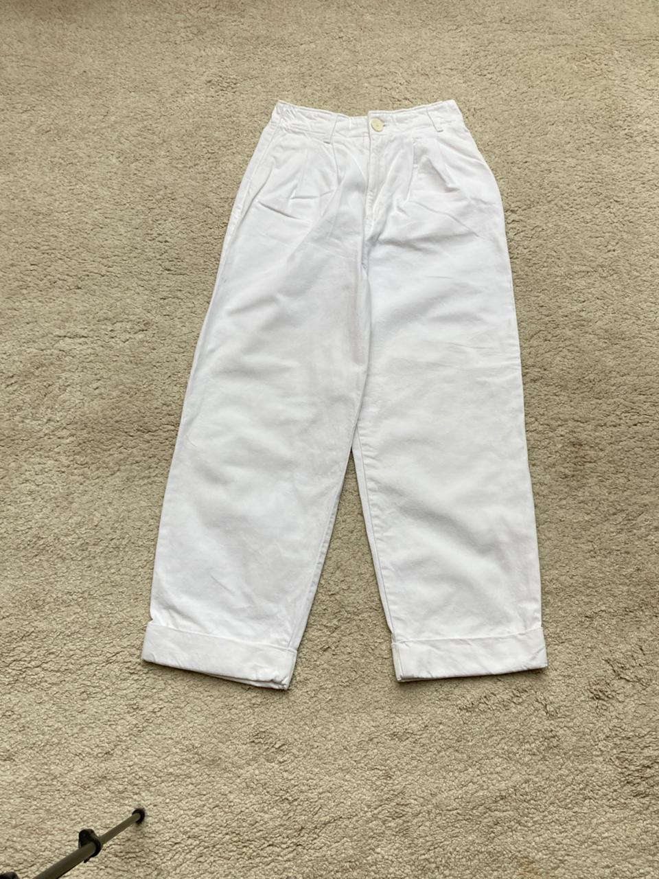 Original photo of white pleated wide-leg trousers
