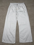 White pleated wide-leg trousers, front view