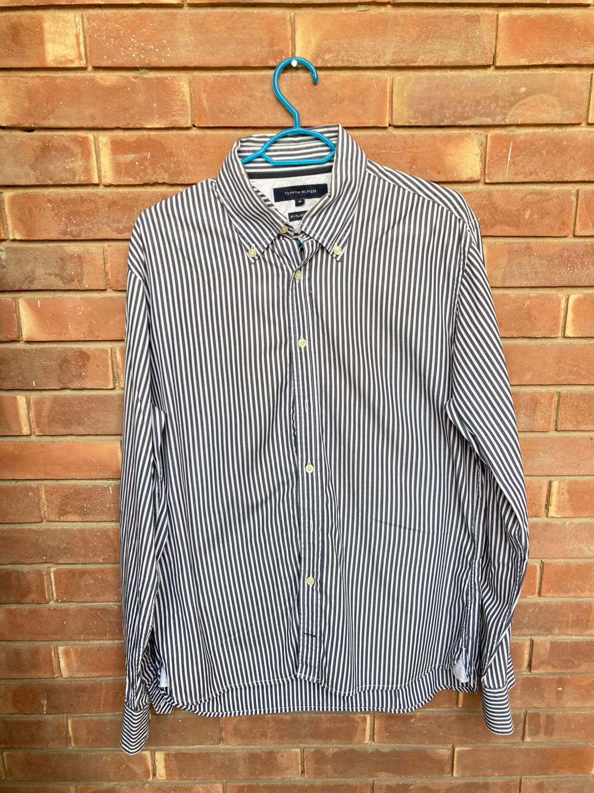 Original condition photo of Tommy Hilfiger navy and white striped shirt