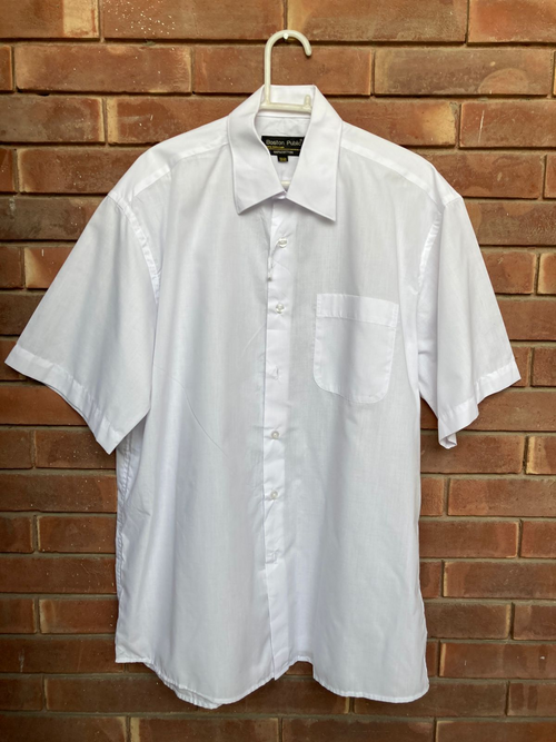 Original condition photo of Boston Public white short-sleeve shirt